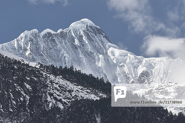 Low angle view of snow covered mountain  Shangri-la County  Yunnan  China