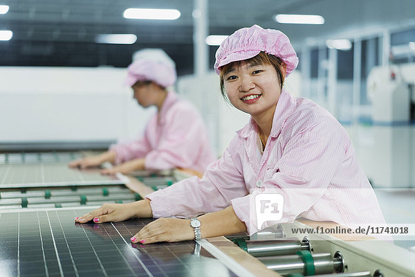 Female workers in solar panel assembly factory  Solar Valley  Dezhou  China