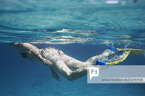 Underwater view of female snorkeler  Bali  Indonesia