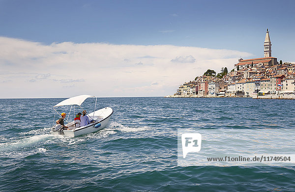 Family with two children in motor boat  Rovinj  Istria Peninsula  Croatia