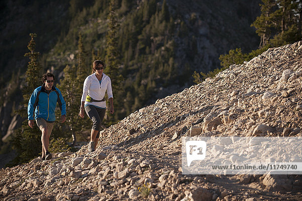Hikers on Sunset Peak trail  Catherine's Pass  Wasatch Mountains  Utah  USA