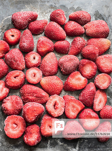 Halved frozen strawberries