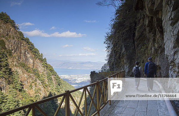 Couple hiking in Cang Mountains Dali Yunnan China Asia