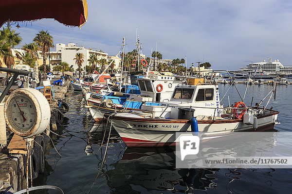 Fishing boats and cruise ship  harbour  Kos Town  Kos  Dodecanese  Greek Islands  Greece  Europe