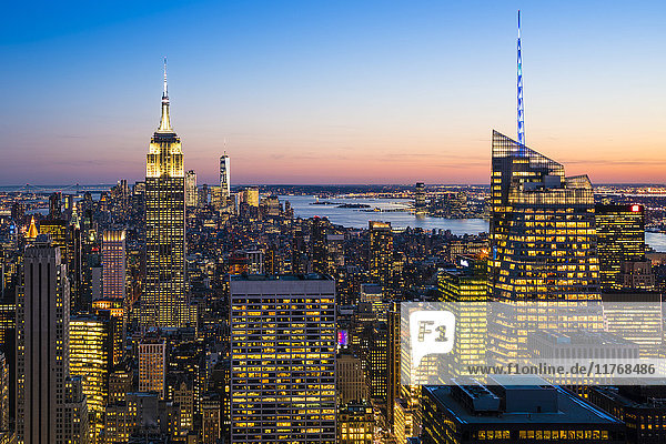 Manhattan skyline and Empire State Building at dusk  New York City  United States of America  North America