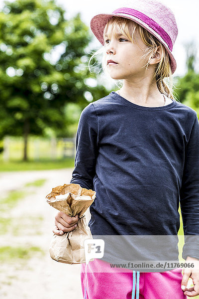 Girl with hat and bag  Kiel  Schleswig-Holstein  Germany  Europe