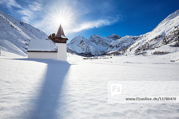 White typical church of Sertig Dorfli. Sertigtal  Graubuenden(Canton Grigioni) Prattigau(Prattigovia)/Davos  Switzerland  Europe.