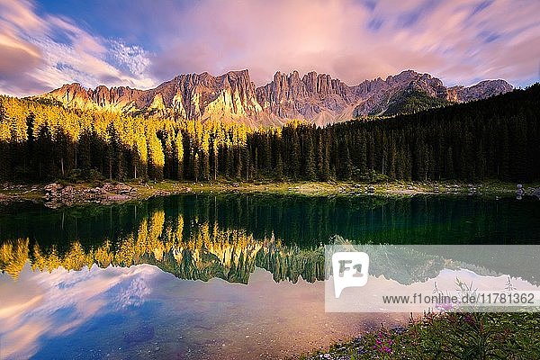 Carezza lake at sunset Bolzano province Trentino Alto Adige district Italy Europe.