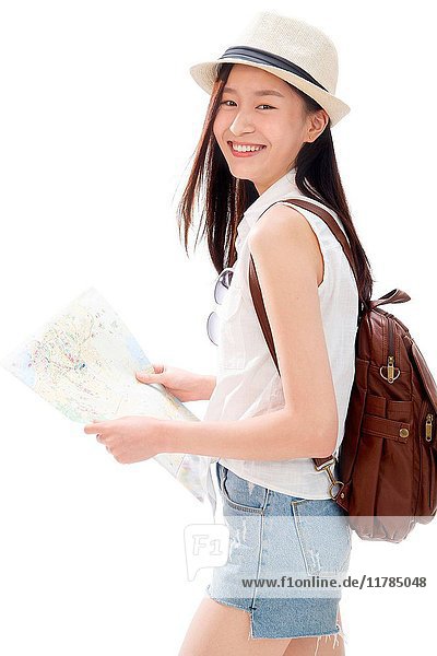 Young woman on travel checking map