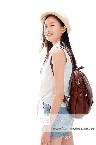 Portrait of young woman with backpack