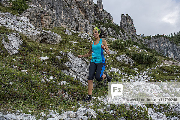 Italy  Dolomites  Veneto  trail runner near Federa Lake