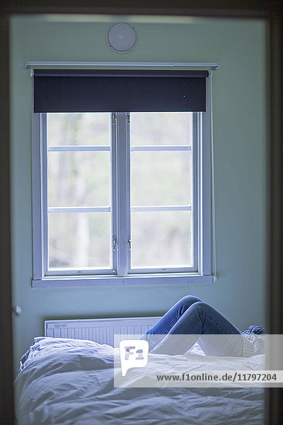 Woman lying in bed