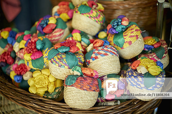 Multicolor trinkets in basket