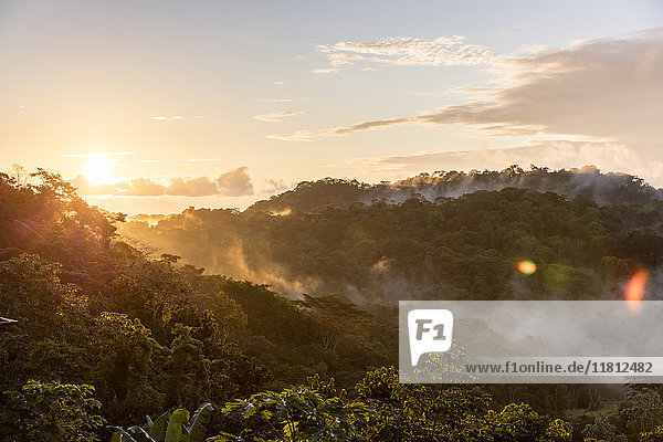 Fog on mountains at sunset