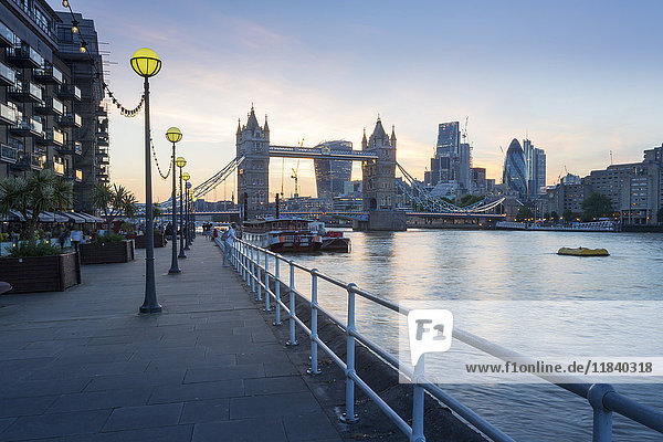Tower Bridge and City of London skyline from Butler's Wharf at sunset  London  England  United Kingdom  Europe