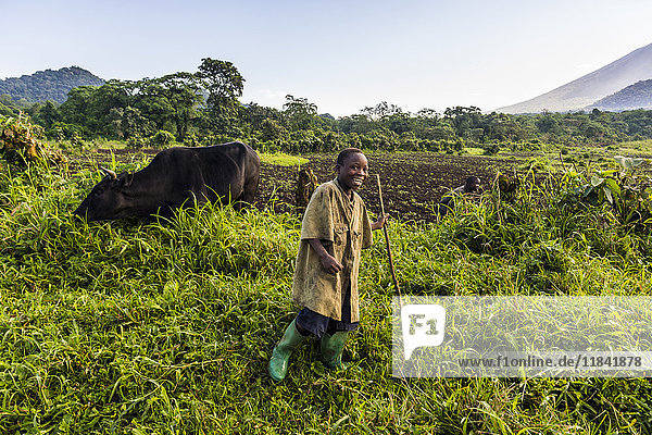Happy young farming boy  Virunga National Park  Democratic Republic of the Congo  Africa