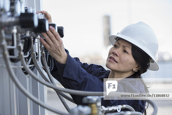 Female engineer working at power plant