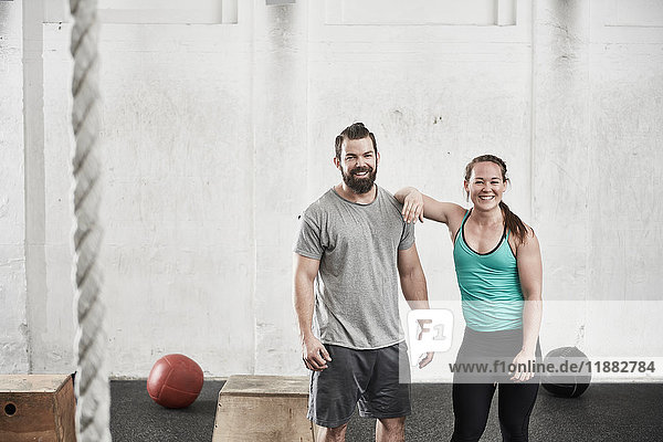 Couple in cross training gym
