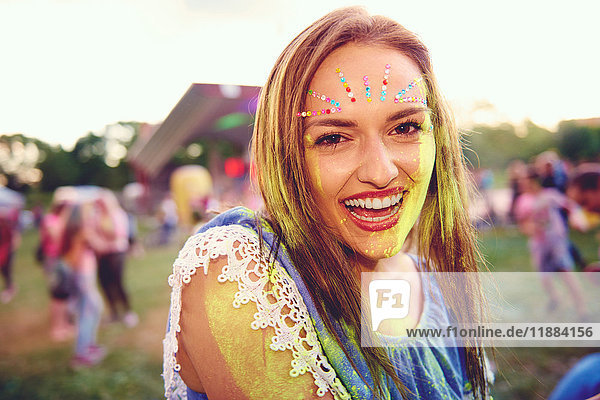 Portrait of young boho woman at festival