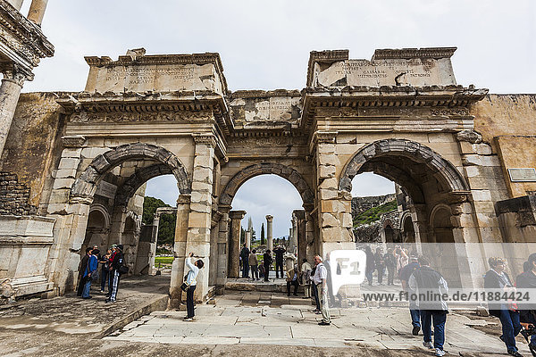 'Tourists walking among the ruins of Celsus Library; Ephesus  Izmir  Turkey'