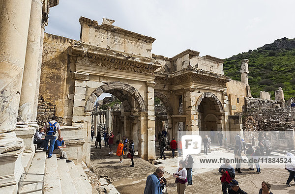 'Tourists walking among the ruins of Celsus Library; Ephesus  Izmir  Turkey'