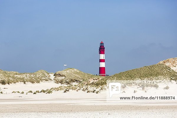 Sandy beach with lighthouse  Amrum  North Frisian Islands  Schleswig-Holstein  Germany  Europe