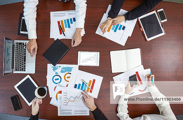 Multi-ethnic group having a business meeting
