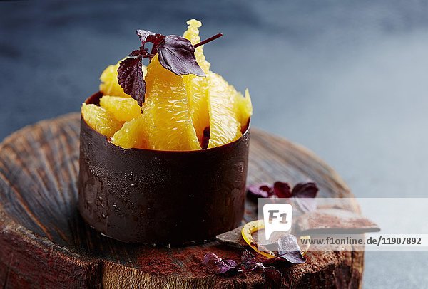 Orange fillets in a chocolate cup