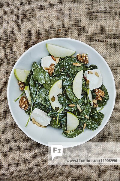 Spinach salad with goat's cheese  apple and nuts