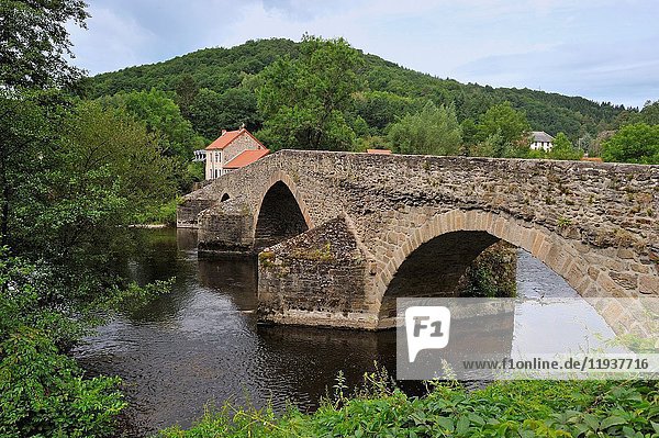 Medieval bridge of Menat across the River Sioule,  Puy-de-Dome department,  Auvergne-Rhone-Alpes region,  France,  Europe.