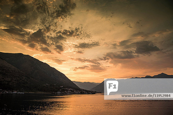 Silhouette of mountains by water at sunset  Kotor  Montenegro  Europe