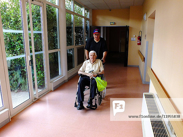 A centenarian arriving at hospital.