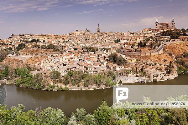 View over Tajo River at Santa Maria Cathedral and Alcazar UNESCO World Heritage Site Toledo Castilla-La Mancha Spain Europe