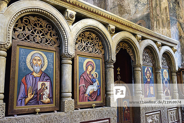 Interior view of the medieval Sapara Monastery. Arches and icon paintings.