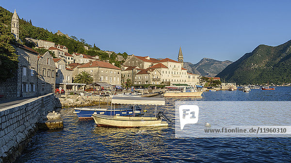 View of boats in harbour and town of Perast in the Bay of Kotor  Montenegro.