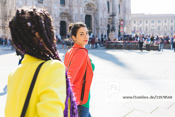Women outside Il Duomo  Milan  Italy