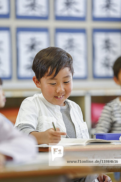 Japanese elementary school kid in the classroom