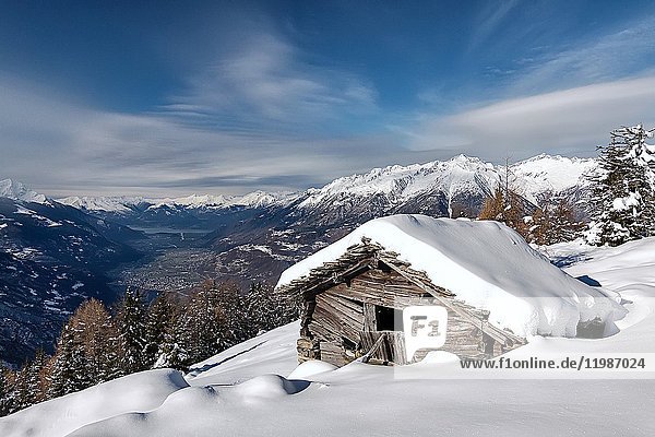 Snow chalet at Orobie Alps Valtellina Lombardy Italy.