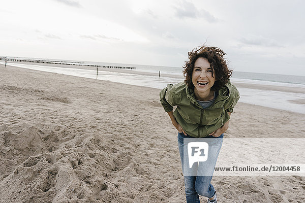 Portrait of happy woman on the beach