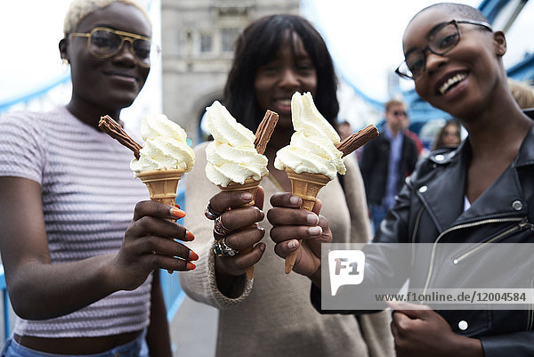 Three friends with soft ice cream