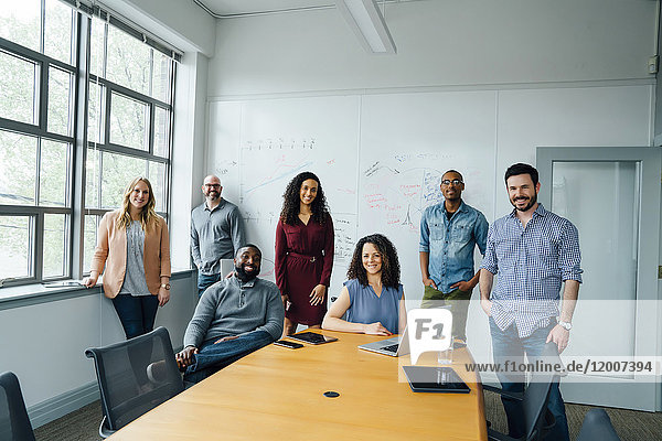 Portrait of diverse business people in conference room