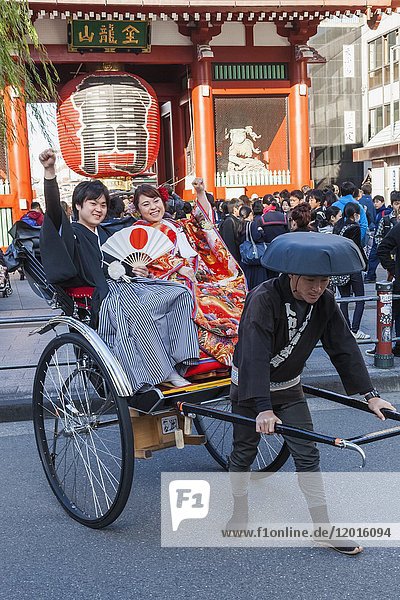 Japan  Honshu  Tokyo  Asakusa  Couple in Rickshaw