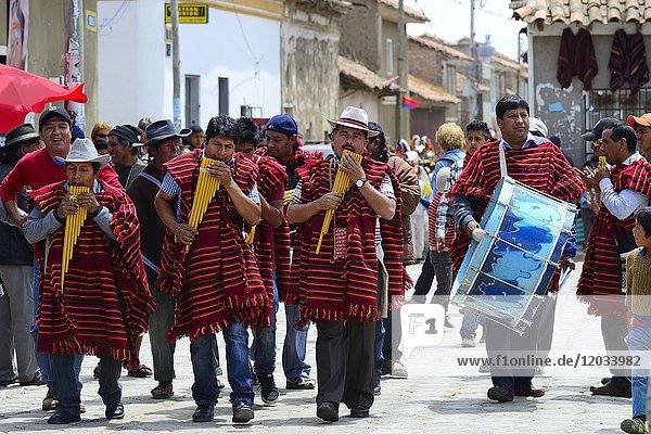 Music group in Ponchos with Siku  Panflute  Festividad Virgen del Rosario  Tarabuco  Chuquisaca  Bolivia  South America