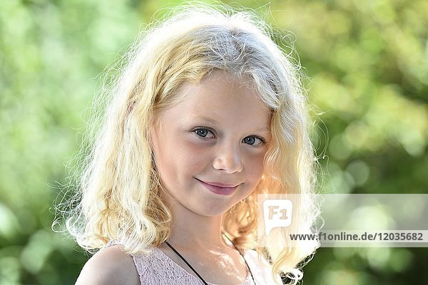 Little girl with blond hair  portrait  Sweden  Europe
