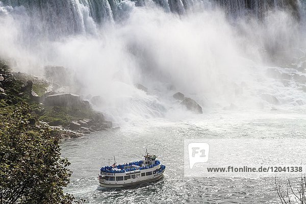 Tourist boat in front of waterfall  American Falls  Niagara Falls  Ontario  Canada  North America