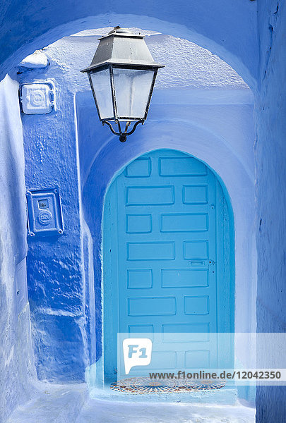 Blue door and wall in the old town of Chefchaouen (Chaouen) (The Blue City) Morocco North Africa Africa