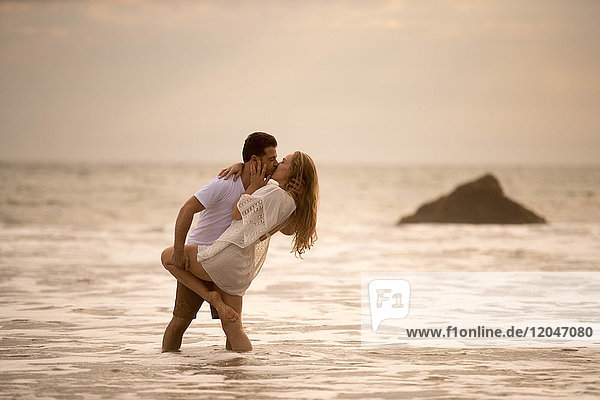 Romantic couple on beach  Malibu  California  US