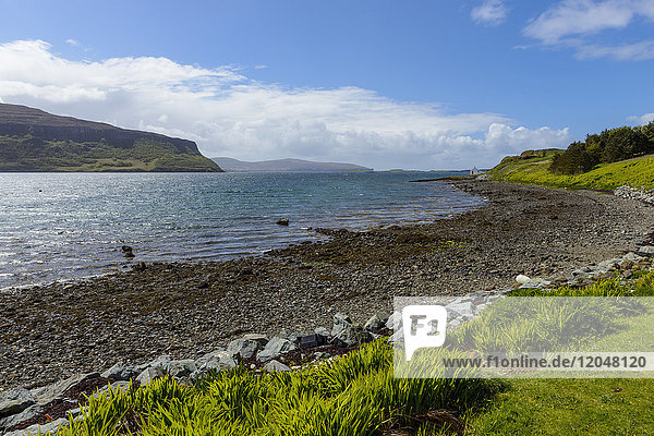 Shingle beach and coastal landscape on the Isle of Skye in Scotland United Kingdom