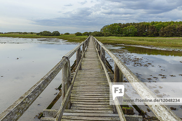 Wooden footbridge over Aberlady Bay in East Lothian in Scotland  United Kingdom