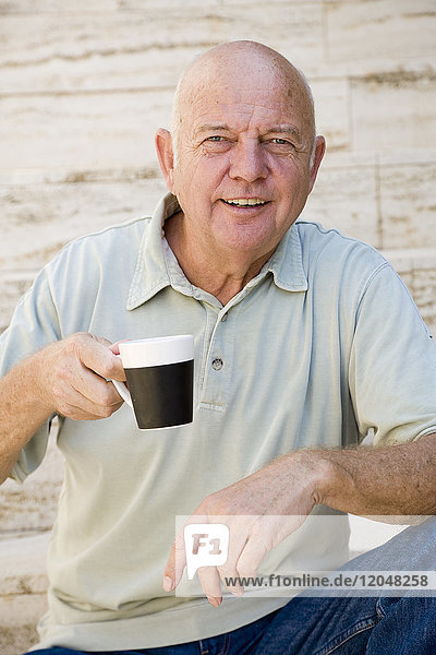 Portrait of Man Drinking Coffee